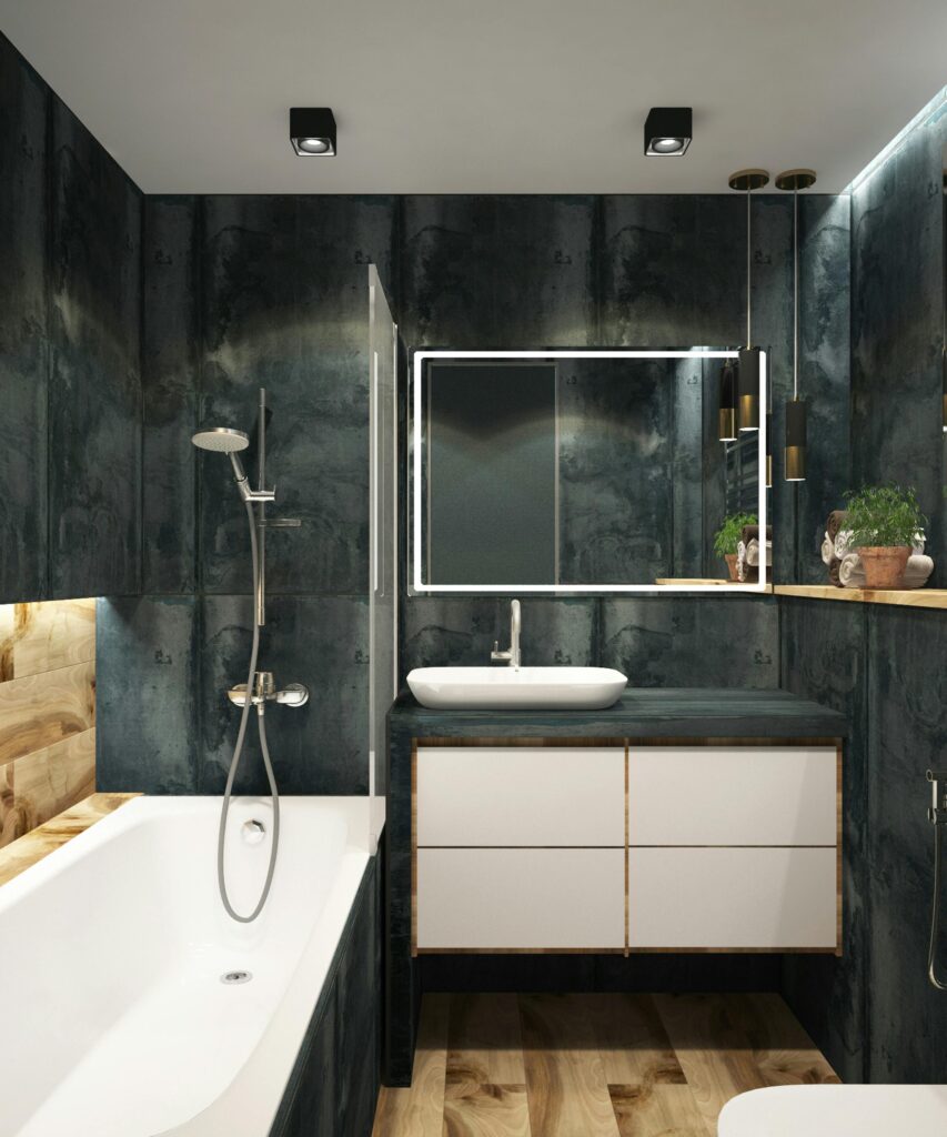 Work Portfolio A contemporary bathroom showcasing black marble walls, clean lines, and modern fixtures, exuding luxury and style.